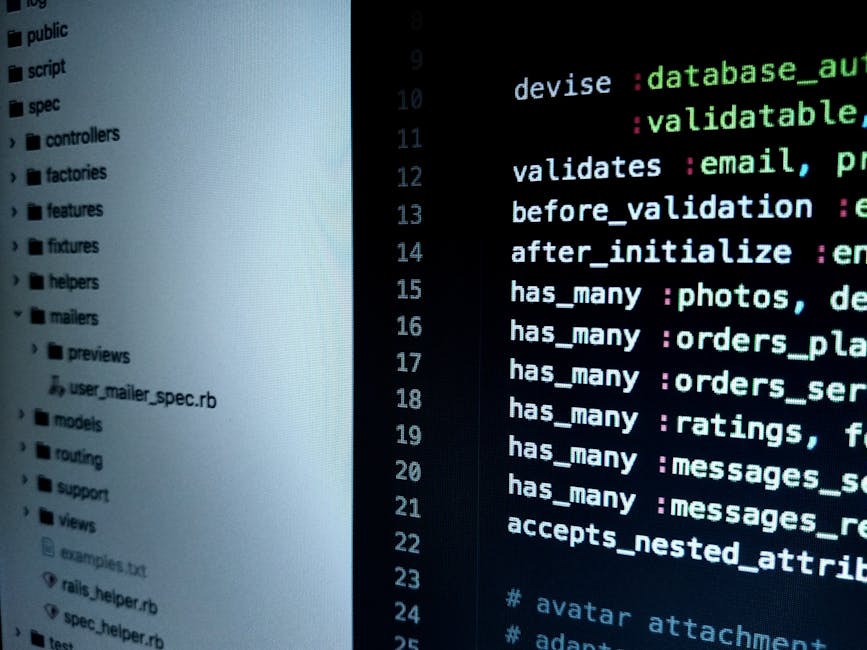 A close-up of a computer screen displaying lines of colorful programming code, with syntax highlighting in shades of blue, pink, green, and white. The code appears to be JavaScript or a similar langua
